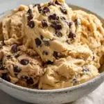 Three flavors of edible cookie dough in attractive bowls