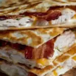 Delicious Chicken Bacon Ranch Quesadillas served with ranch dressing
