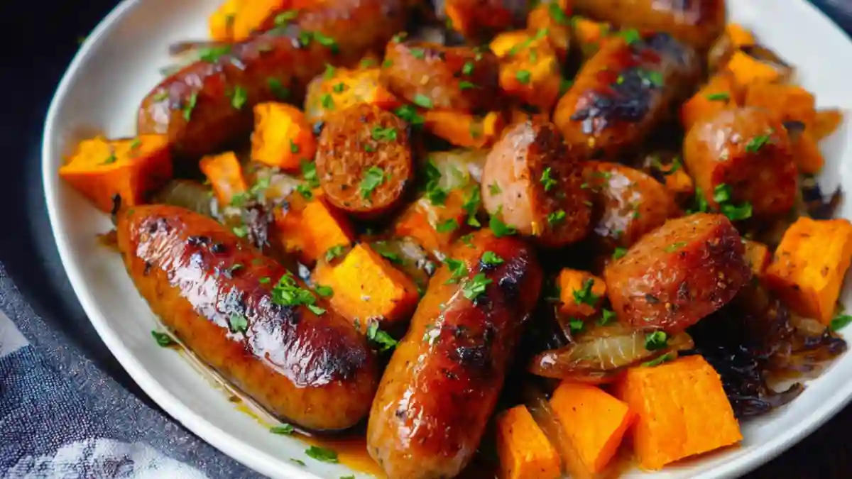 Honey garlic sausage served with roasted sweet potatoes