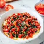 Boursin Bruschetta Dip served in a bowl with fresh toppings
