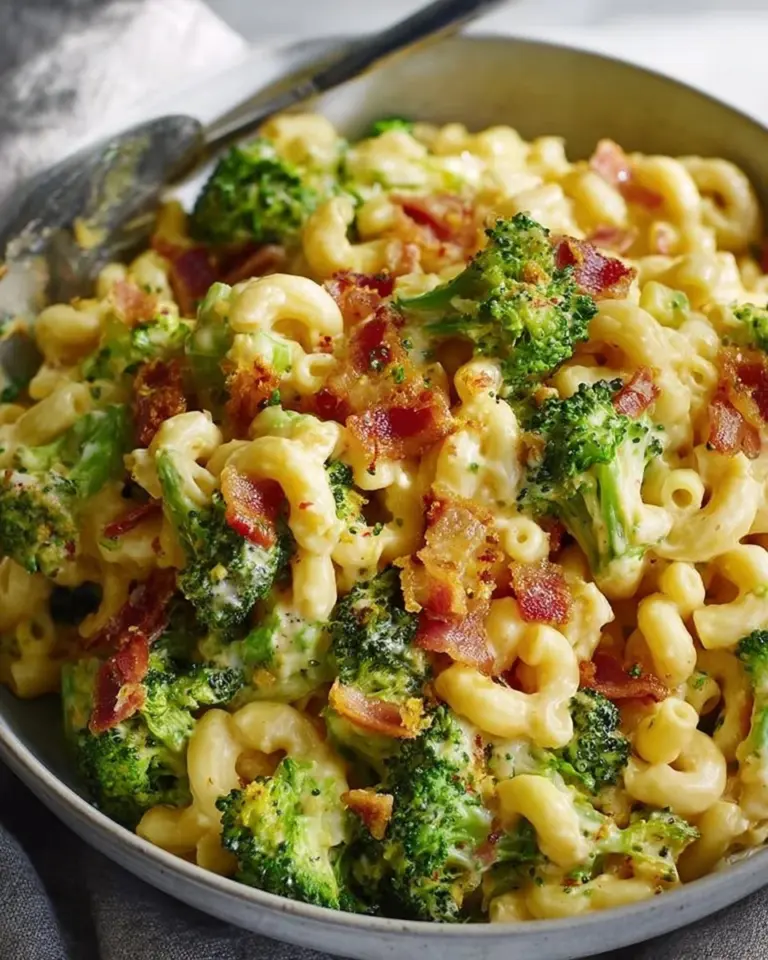 Bowl of homemade one-pot bacon broccoli mac and cheese on a kitchen table