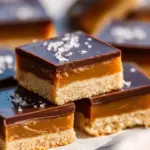 Delicious Millionaire's Shortbread layered with caramel and chocolate
