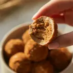 Delicious no-bake Biscoff truffles coated in chocolate and dusted with cookie crumbs.