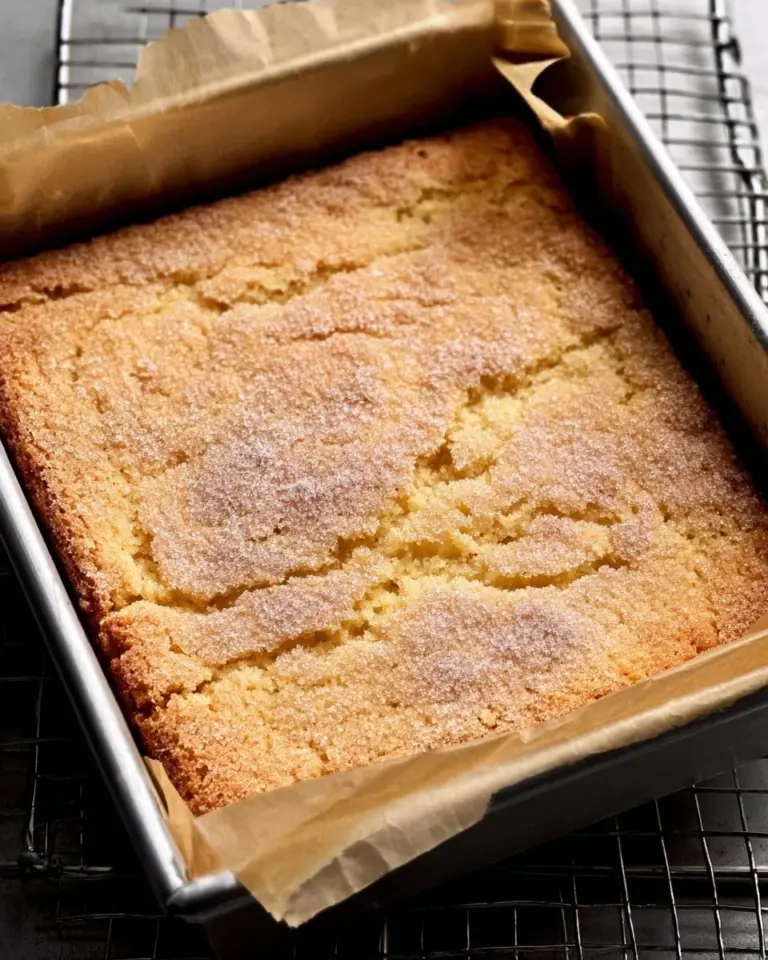 Delicious Cardamom Coffee Cake displayed on a rustic table