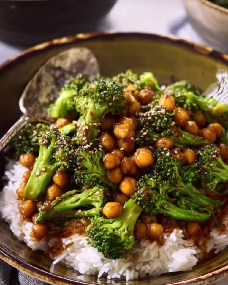 Colorful broccoli stir fry with chickpeas and veggies in a serving bowl