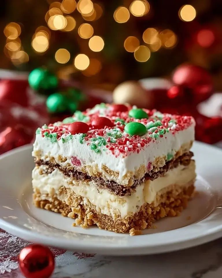 Delicious Christmas Dessert Lasagna with festive layers of cheesecake and chocolate