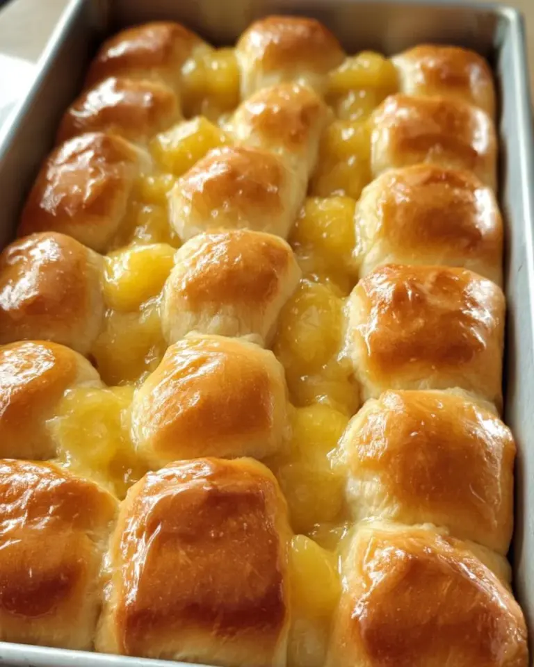 Delicious homemade orange rolls with a warm sour cream butter glaze