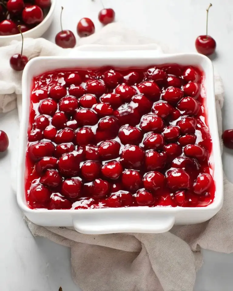 Delicious Cherry Delight dessert with fresh cherries and creamy topping