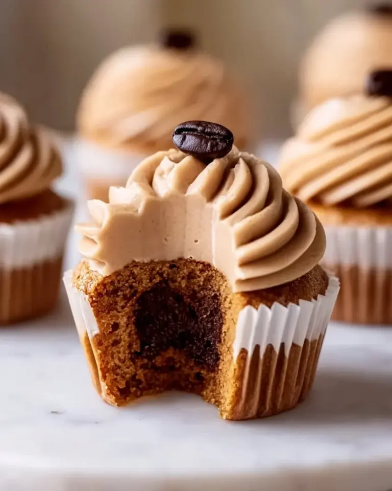 Delicious coffee cupcakes topped with creamy frosting