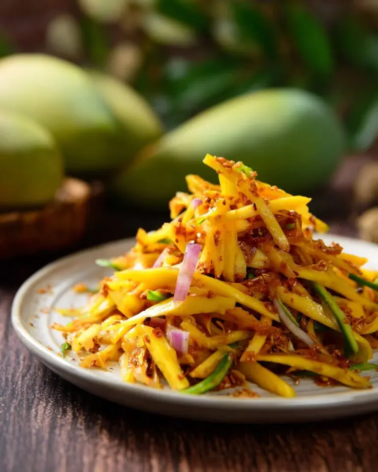 Delicious Thai Green Mango Salad with fresh ingredients and vibrant colors
