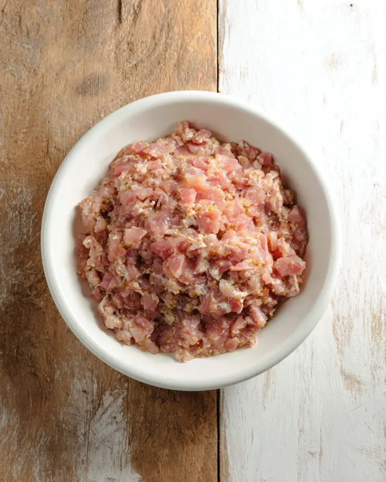 Delicious Thai-style marinated ground pork served with fresh herbs and spices.